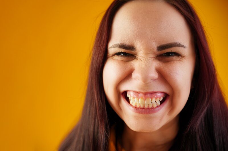 closeup of young woman with overbite